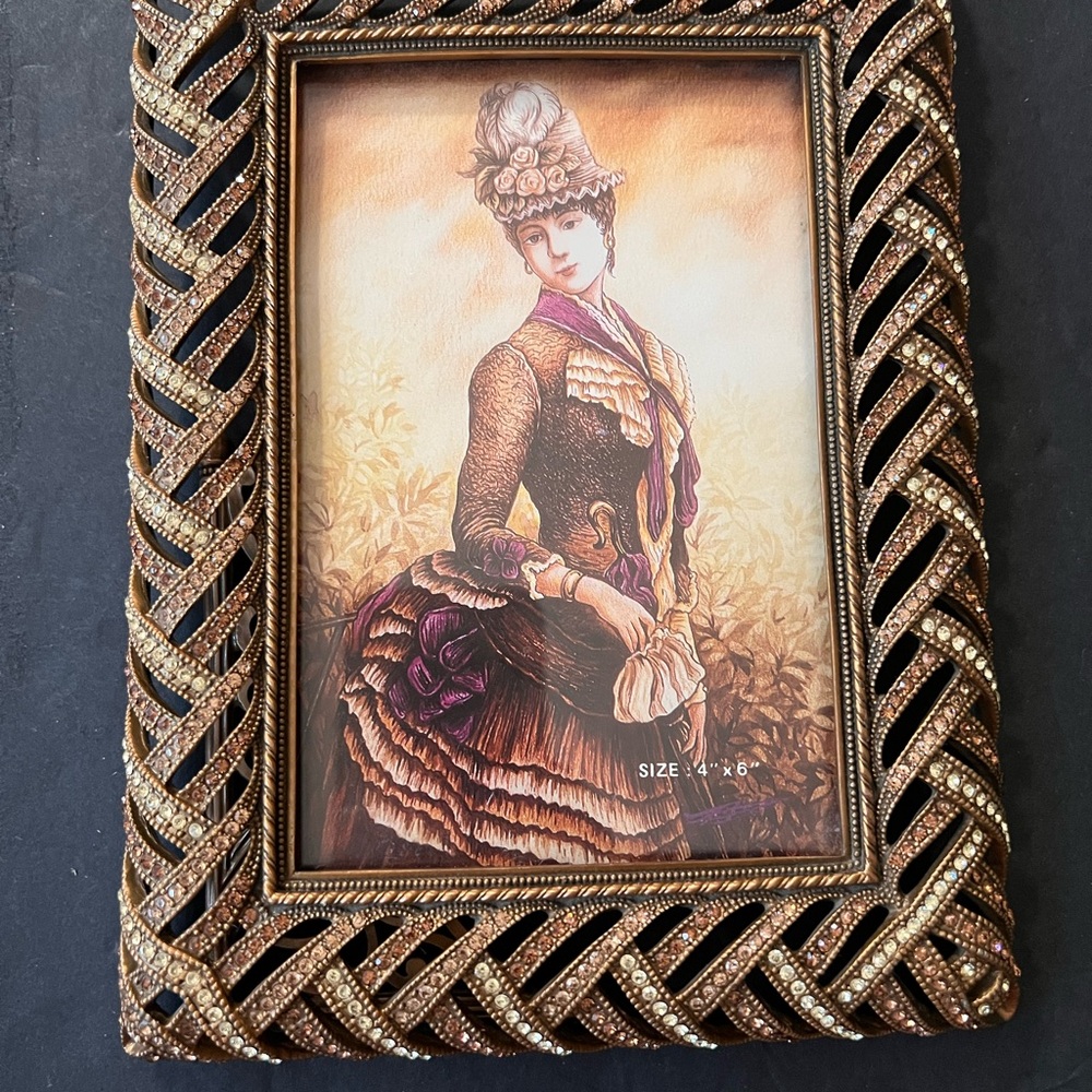 Elegant “Bernadette” jeweled frame. Lt. Smoke Museum gold plate